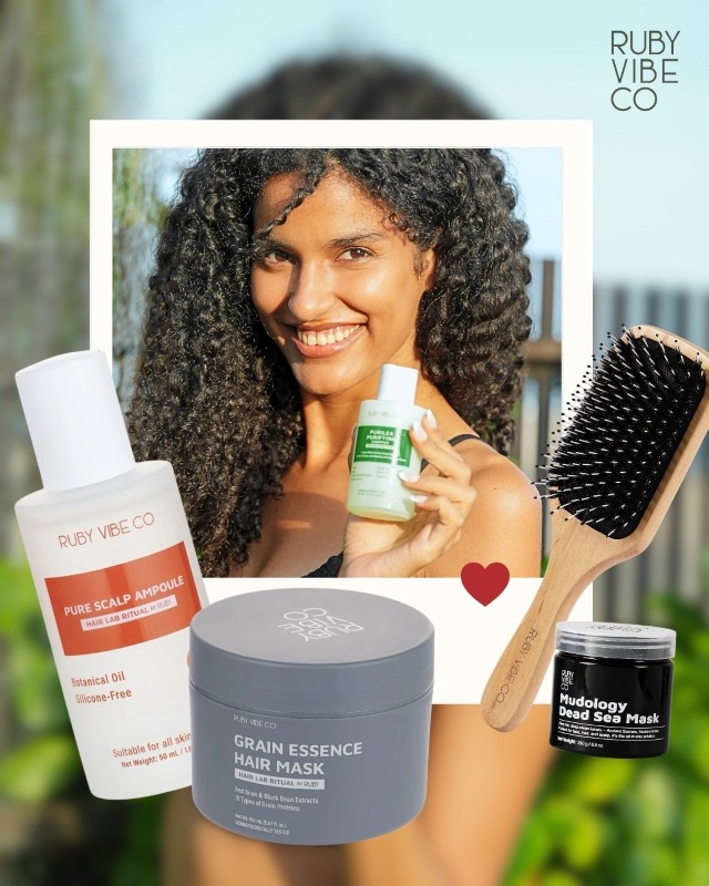 Model holding Ruby Vibe Co hair mask and shampoo outdoors, showcasing natural beauty and hair care routine.